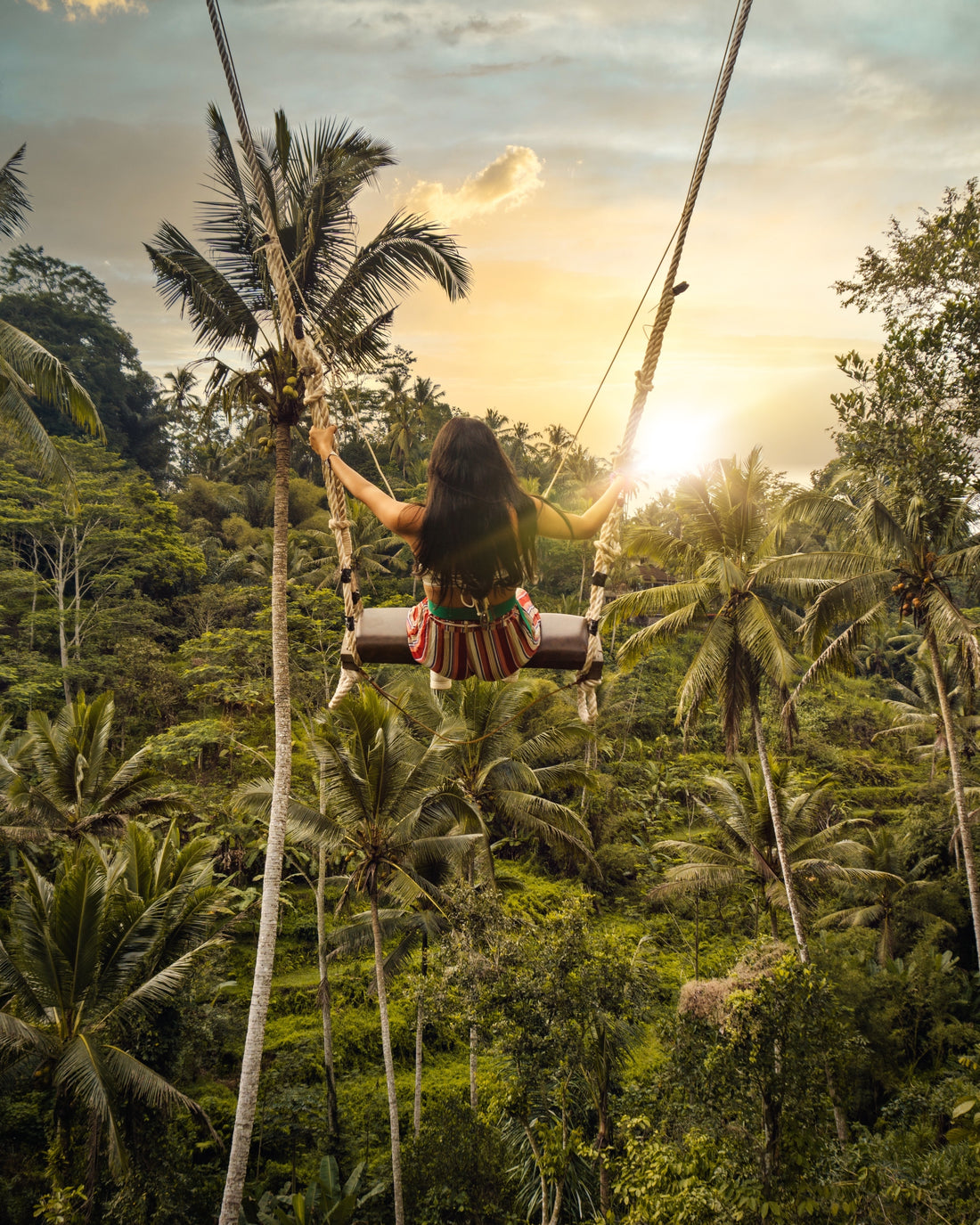 girl on a swing in bali