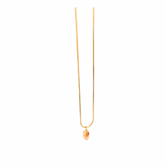 Golden citrine necklace with a faceted gemstone pendant on a delicate chain