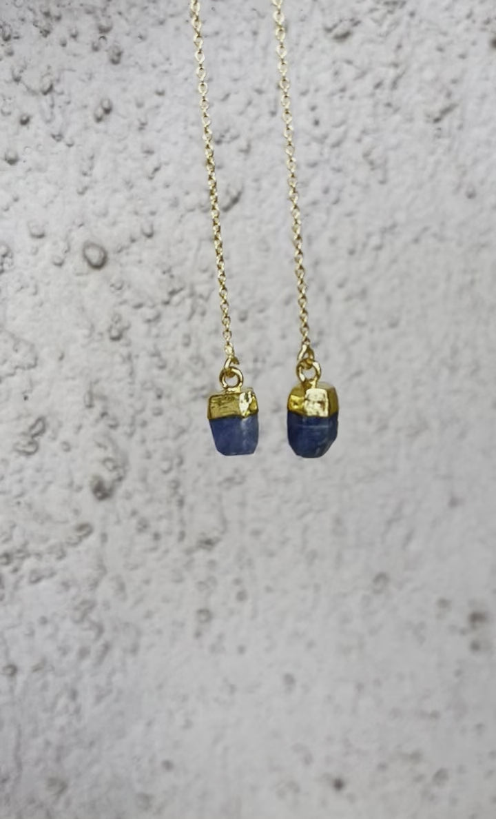 Sapphire threader earrings with long gold chains and raw blue gemstones