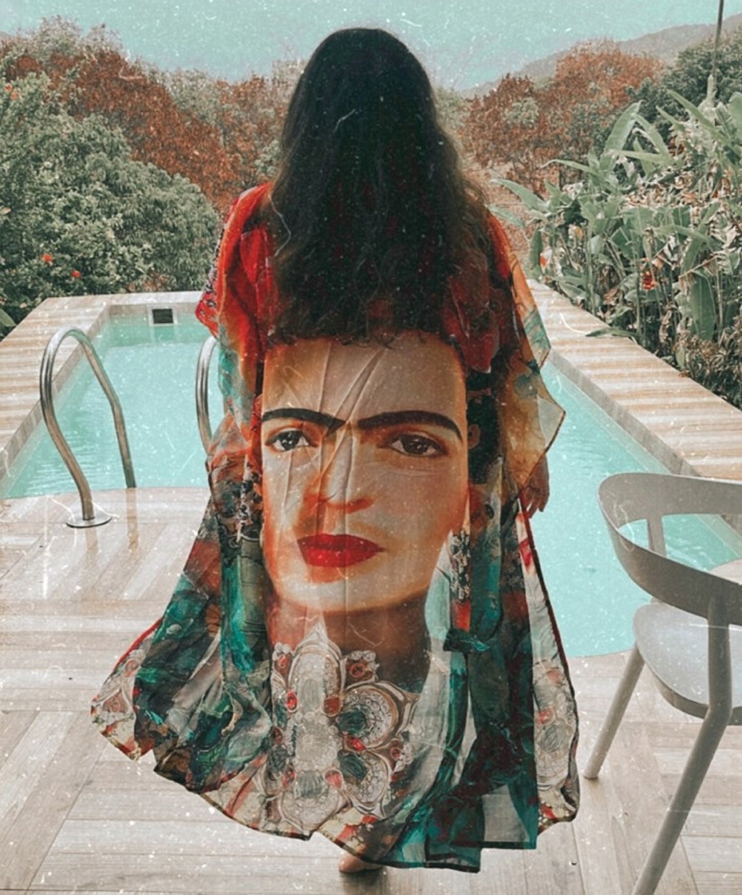 Image of a colorful Frida Kahlo-inspired kaftan with floral patterns and a front tie-up