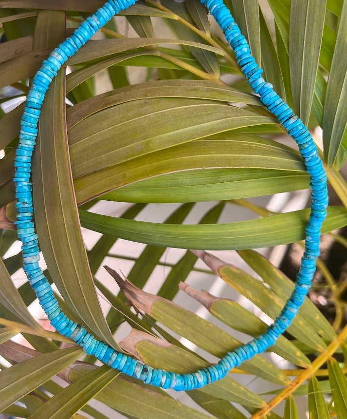 Turquoise necklace featuring vibrant blue stones