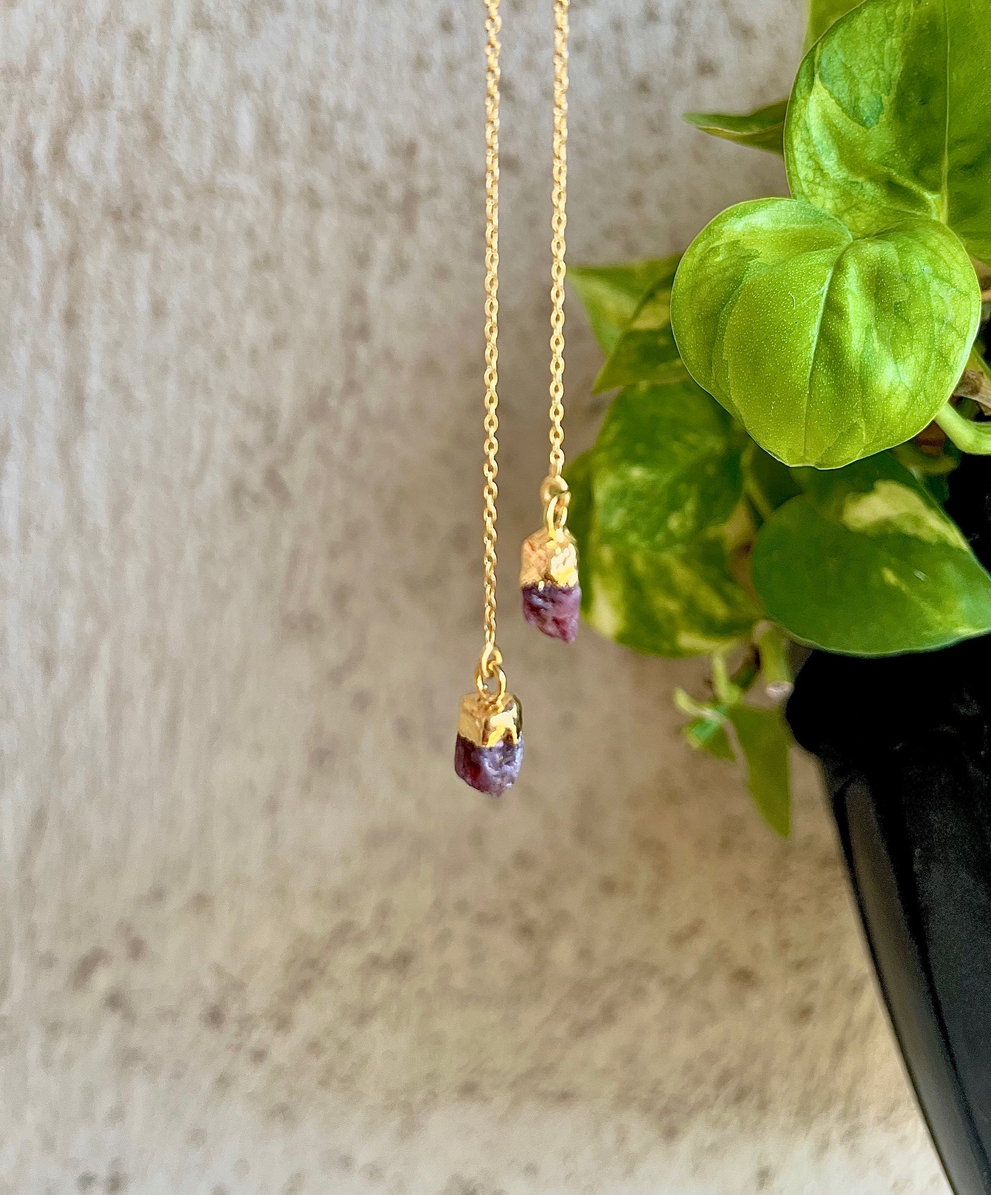 Dainty ruby threader earrings featuring small red gemstones on a thin gold chain